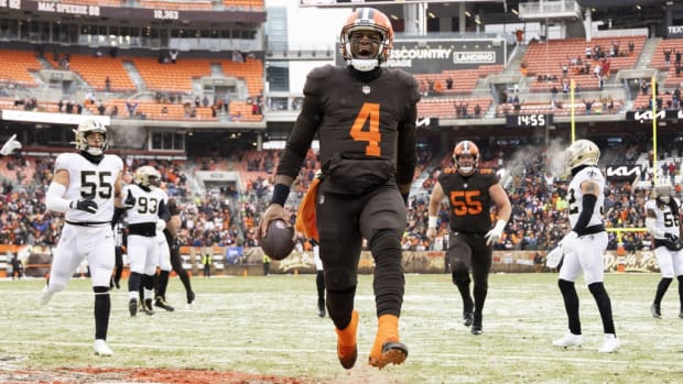 Dec 24, 2022; Cleveland, Ohio, USA; Cleveland Browns quarterback Deshaun Watson (4) runs for a touchdown against the New Orleans Saints during the second quarter at FirstEnergy Stadium. Mandatory Credit: Scott Galvin-USA TODAY Sports